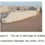 Figure 9 -  The use of sand bags for building construction (Maranjab are) (writer, 2014)